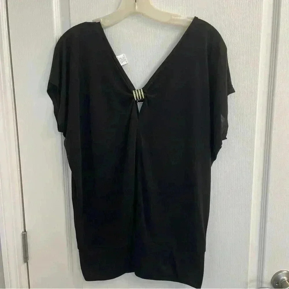 Blouse with bling at the neckline